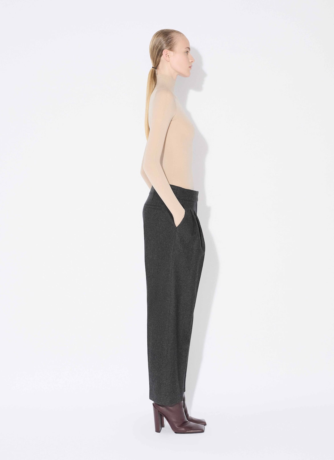 HIGH NECK SECOND-SKIN KNIT BODYSUIT ALAÏA MASTIC HIGH NECK SECOND-SKIN KNIT BODYSUIT
